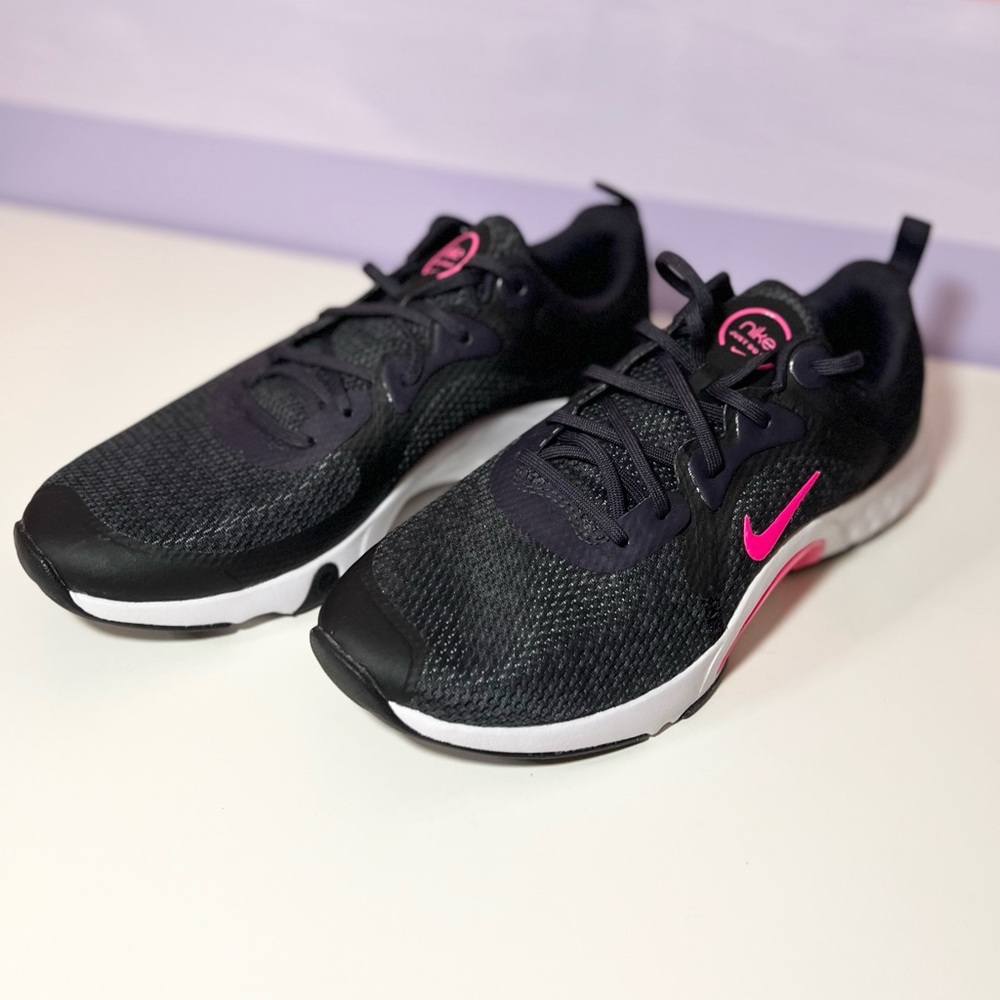 Nike woman’s running shoes size 8 black and hot pink